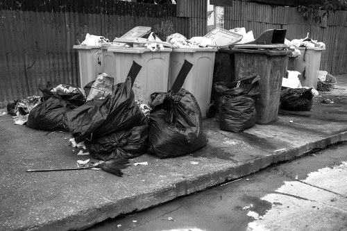 Waste removal trucks navigating Redbridge streets