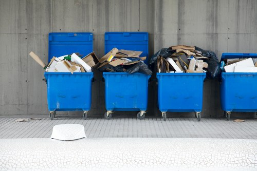 House clearance professionals sorting items in a Redbridge home